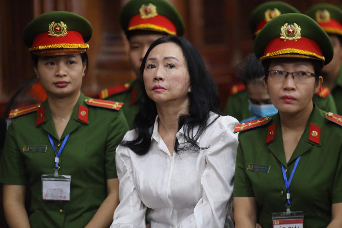 Vietnamese property tycoon Truong My Lan, center, who was earlier sentenced to death by lethal injection, was convicted of fraudulently obtaining property worth billions of dollars in a separate case. (AFP)