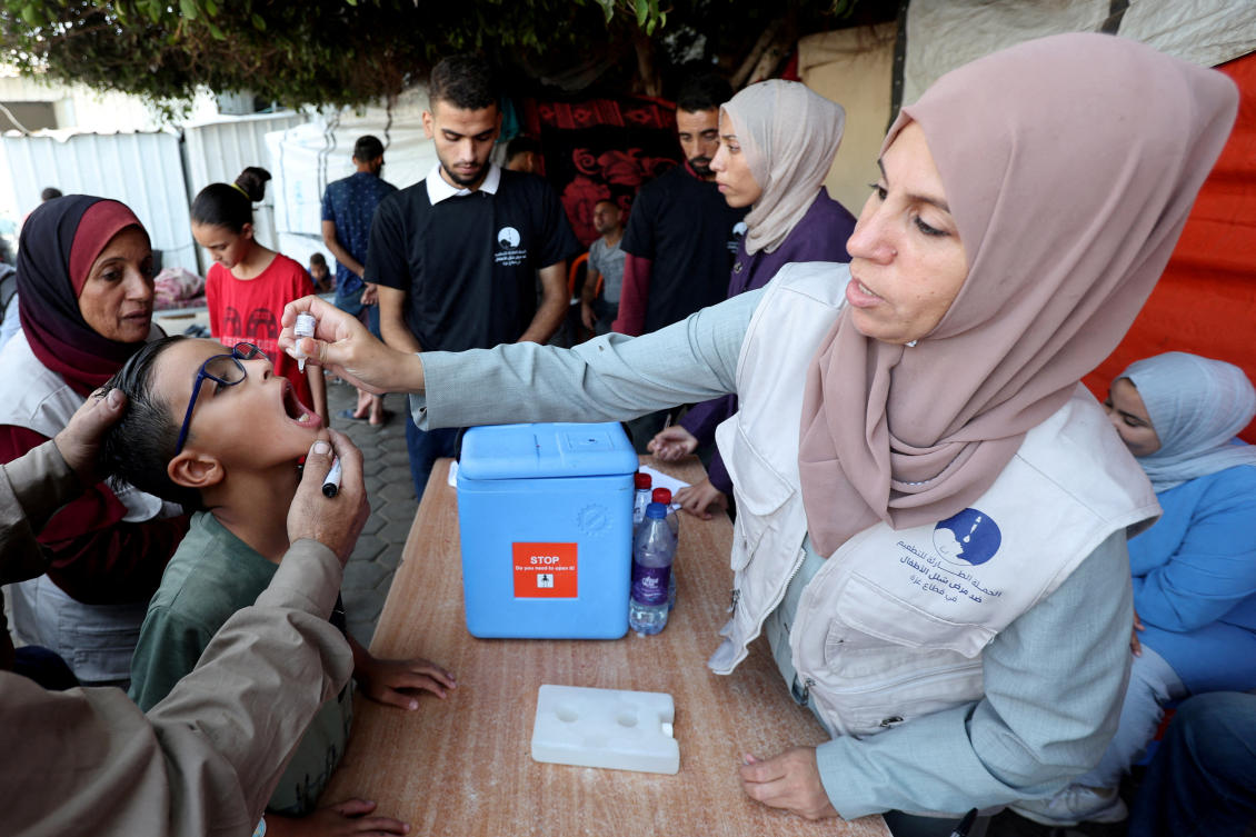 Above, a Palestinian child is vaccinated against polio during the second round of a vaccination campaign in Deir Al-Balah in the central Gaza Strip on Oct. 14, 2024. (Reuters)