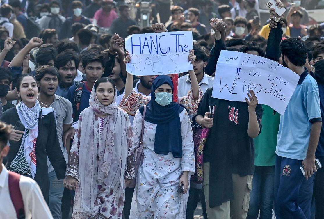 Students carry placards as they march during a demonstration to condemn the alleged rape of a female student in Lahore on October 16, 2024. (AFP)