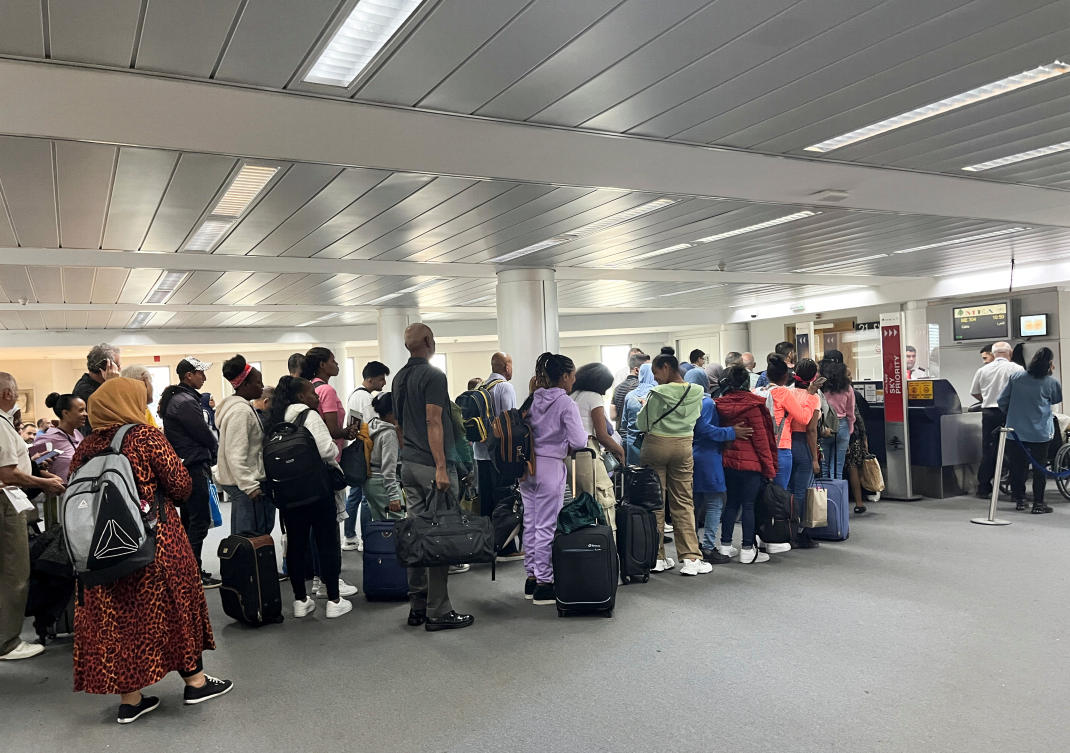 Passengers queue at the check-in counters at Beirut-Rafic Al Hariri International Airport in Beirut, Lebanon October 17, 2024. (Reuters)