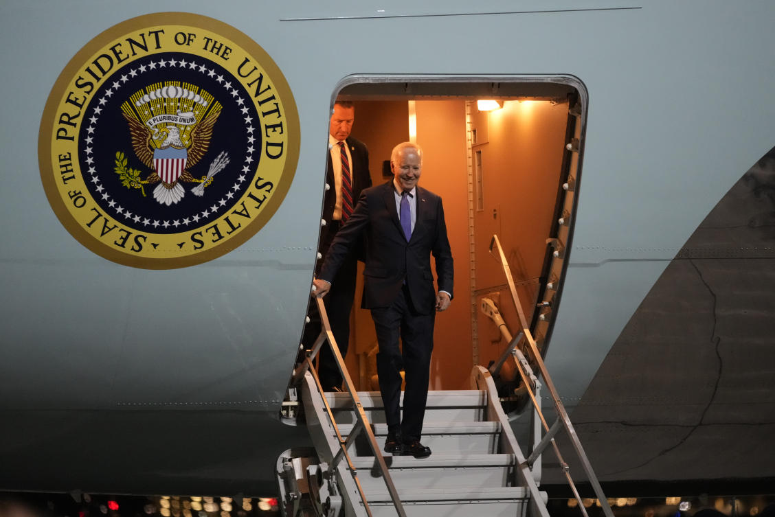 President Joe Biden walks down the stairs of Air Force One as he arrives at Brandenburg Airport in Schoenefeld near Berlin. (AP)
