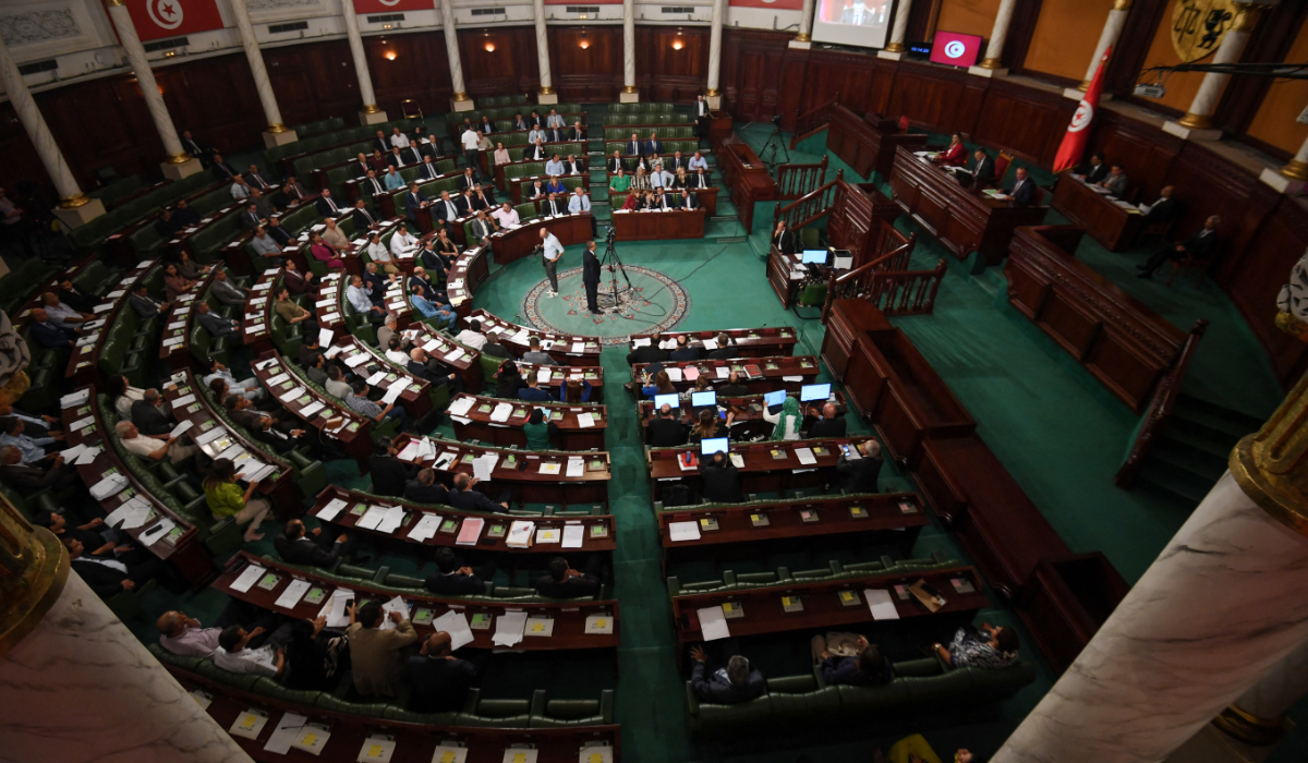 Tunisian members of parliament attend a plenary session to discuss a draft electoral reform, on September 27, 2024 in Tunis. (AFP)