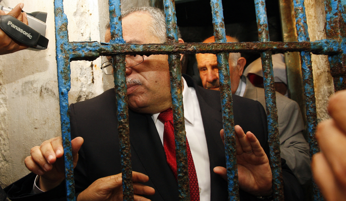 Tunisian Minister of Justice Noureddine Bhiri (C) visits the notorious prison of Ennadhour on April 29, 2012, in Bizerte. (AFP file photo)