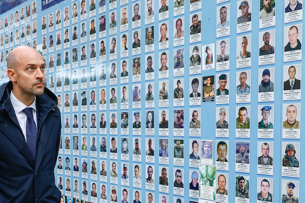 French foreign minister Jean-Noel Barrot visits the Memory Wall of Fallen Defenders of Ukraine outside Saint Michael’s Cathedral in Kyiv, Ukraine on Oct. 19, 2024. (Reuters)