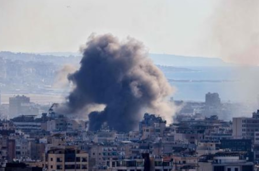 Thick smoke billows over buildings following an Israeli airstrike on Beirut’s southern suburb of Haret Hreik on October 19, 2024, amid the ongoing war between Israel and Hezbollah. (AFP)