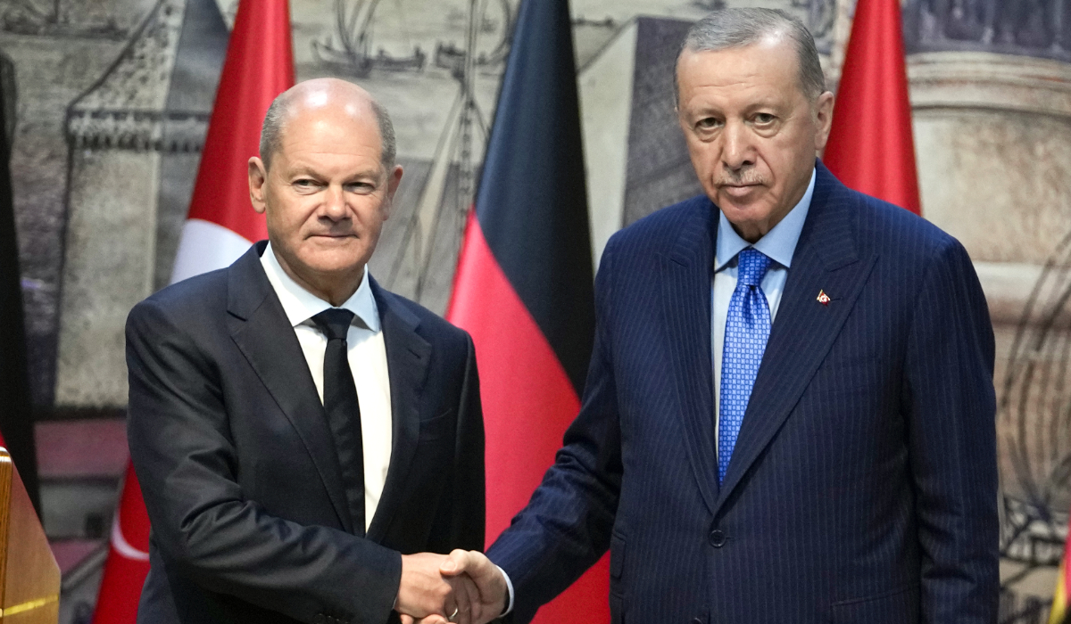 Turkey's President Recep Tayyip Erdogan, right, shakes hands with Germany's Chancellor Olaf Scholz, following a press conference in Istanbul, Turkey, Saturday, Oct. 19, 2024. (AP)