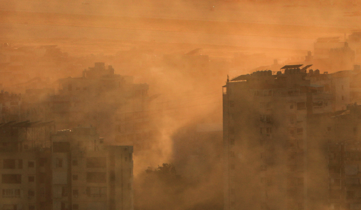 Smoke fumes cover a neighbourhood of Beirut's southern suburbs near Beirut International Airport following an Israeli airstrike on on October 19, 2024. (AFP)