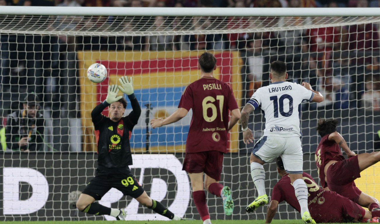 Inter Milan's Lautaro Martinez scores their first goal during the Serie A football match between AS Roma and Inter Milan at Stadio Olimpico, Rome, Italy on October 20, 2024. (Reuters)