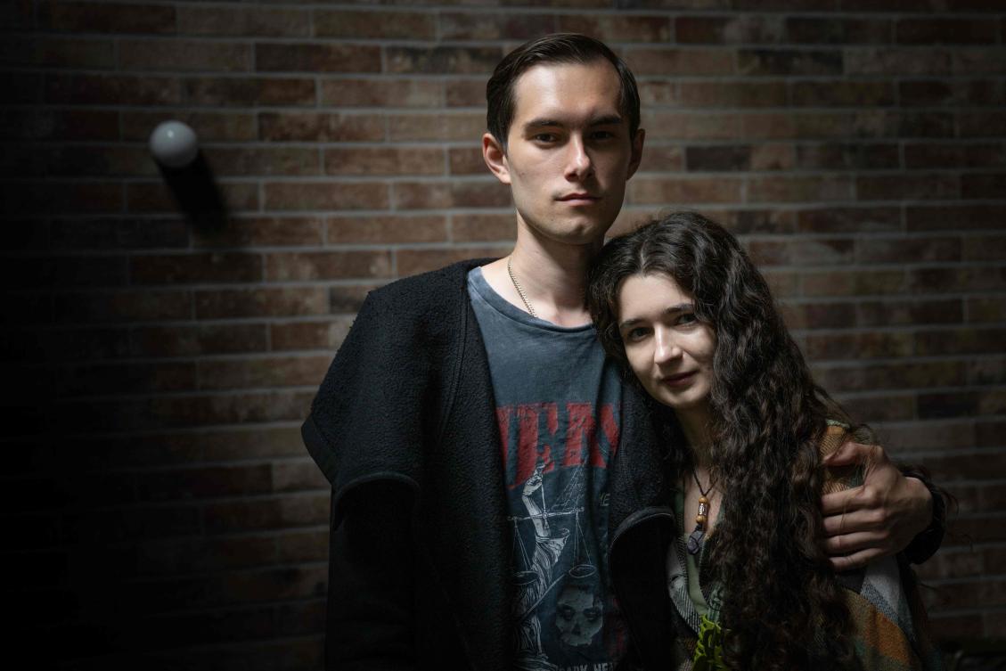 Russian army deserter and dissident Alexander poses for photograph with his wife Irina during an interview with AFP at an undisclosed location. Six Russian soldiers who fled the fighting in Ukraine have found refuge in France and hope to receive asylum here, in a landmark case of Russian deserters being welcomed in a EU country.(AFP)