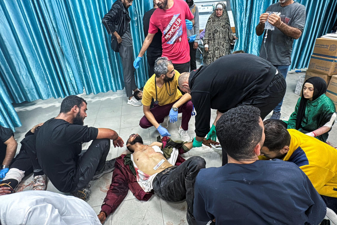 Medical personnel assist Palestinian casualties of Israeli fire at Kamal Adwan hospital in Jabalia on the northern Gaza Strip on Oct. 21, 2024. (Reuters)