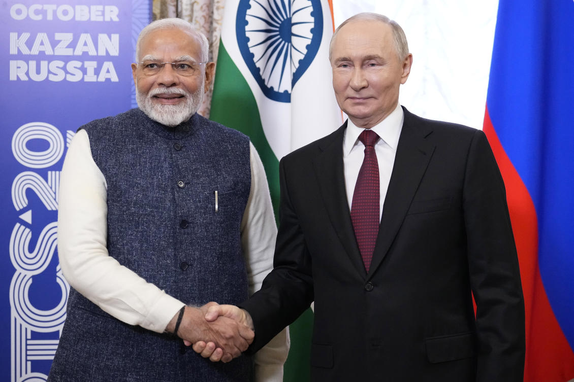 Russian President Vladimir Putin, right, and Indian Prime Minister Narendra Modi meet on the sidelines of BRICS Summit at Kazan Kremlin in Kazan, Russia on Oct. 22, 2024. (AP)
