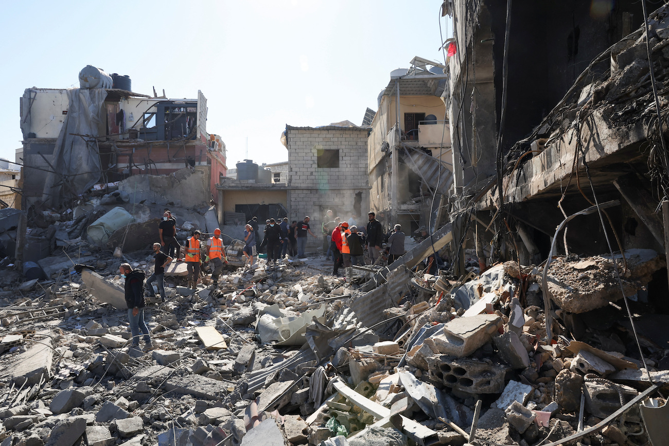 Rescuers search for survivors at the site of an Israeli strike near Rafik Hariri University Hospital in Beirut, Lebanon October 22, 2024. (Reuters)