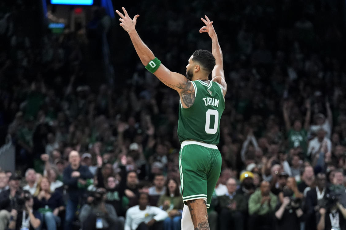 Boston Celtics forward Jayson Tatum celebrates after a 3-pointer against the New York Knicks. (AP)