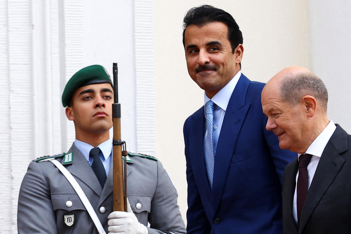 German Chancellor Olaf Scholz receives Qatar's Emir Sheikh Tamim bin Hamad al-Thani at the German government's guest house, Schloss Meseberg castle, north of Berlin, in Gransee, Germany. (Reuters)