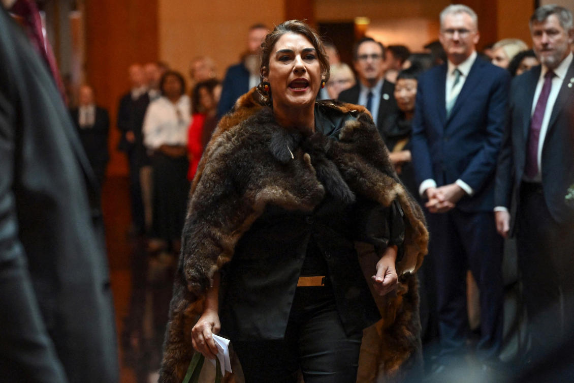 Above, Senator Lidia Thorpe before she was escorted away by security during the parliamentary reception for King Charles on Oct. 21, 2024. (Reuters)