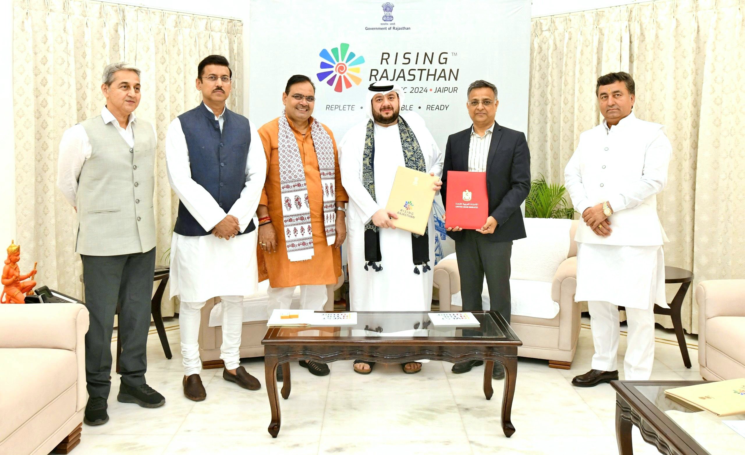 Rajasthan’s chief minister Bhajan Lal Sharma and UAE Minister of Investment Mohamed Hassan Al-Suwaidi pose for a photo with officials in Jaipur, Rajasthan on Oct. 22, 2024. (Government of Rajasthan)