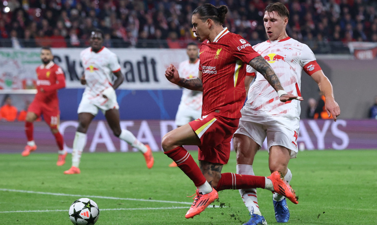 Liverpool's Uruguayan striker #09 Darwin Nunez (L) and Leipzig's Hungarian defender #04 Willi Orban vie for the ball during the UEFA Champions League football match between RB Leipzig and Liverpool FC in Leipzig, eastern Germany on October 23, 2024. (AFP)