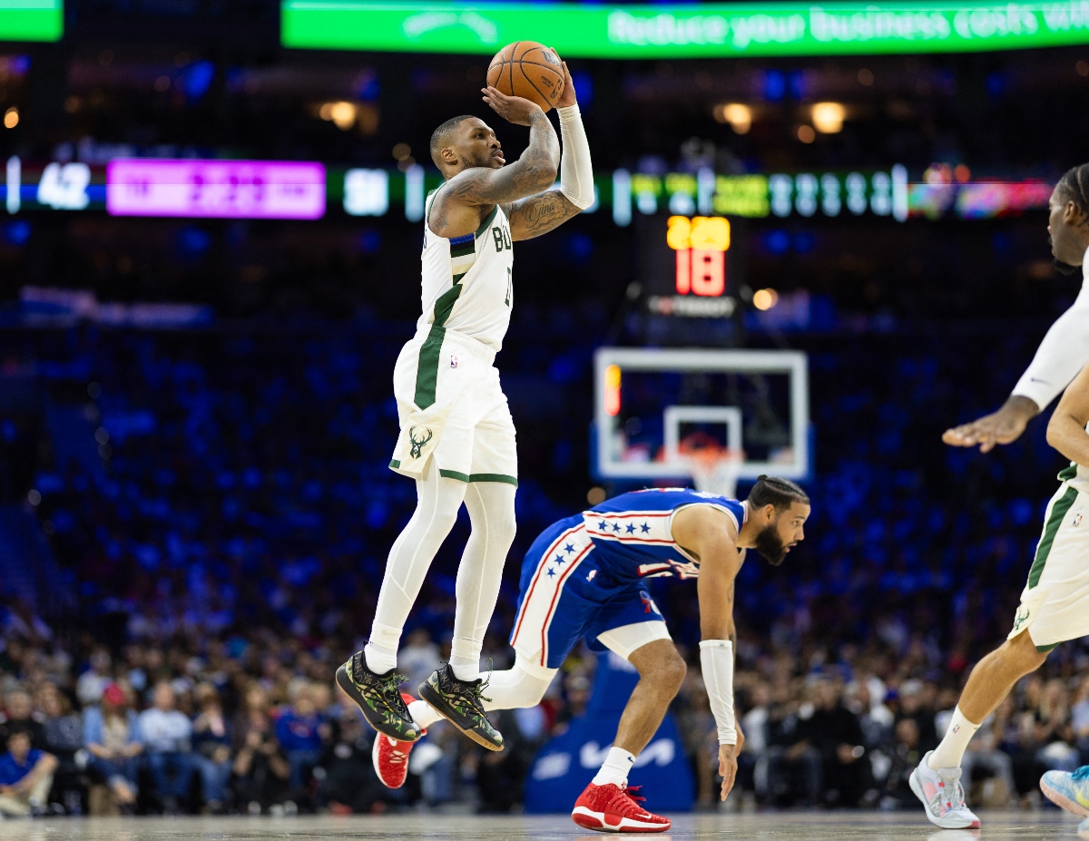 Milwaukee Bucks guard Damian Lillard shoots over Philadelphia 76ers forward Caleb Martin during the second quarter of their NBA game at Wells Fargo Center Wednesday. (USA TODAY Sports)
