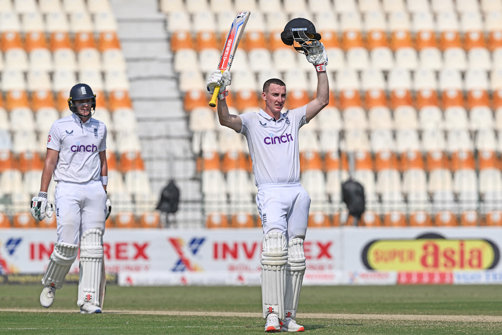 England’s Harry Brook, right, celebrates after scoring a triple century during the fourth day of the first Test cricket match between Pakistan and England at the Multan Cricket Stadium in Multan on Oct. 10, 2024. (AFP)