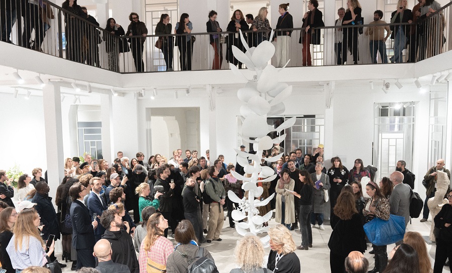 Visitors to the opening night of 'Orbis Tertius' in Paris surround Monira Al-Qadiri's 'The Guardian'. (Supplied)