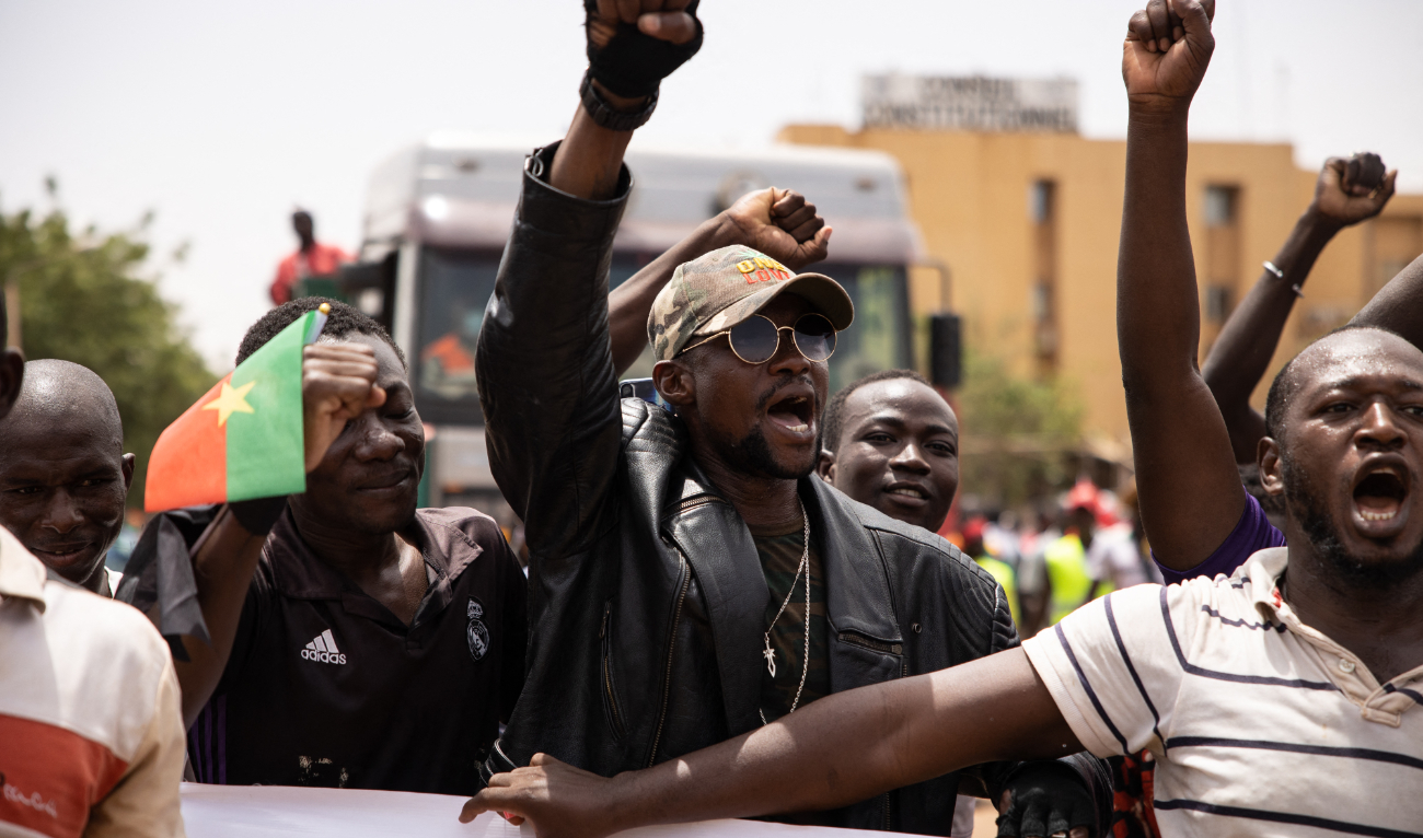 People take part in a march called by the opposition to protest against the security situation worsening and asking for a response to jihadist attacks, in Ouagadougou, on July 3, 2021. (AFP/File)