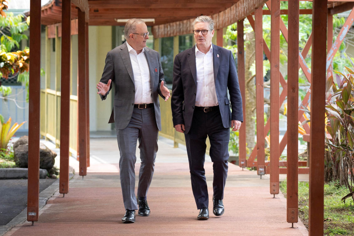 Britain’s Prime Minister Keir Starmer, right, walks with Australian Prime Minister Anthony Albanese following their bilateral meeting during the Commonwealth Heads of Government Meeting in Samoa. (Reuters)