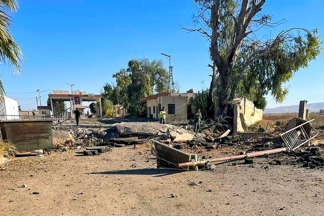 Above, the aftermath of an Israeli strike on the Jousieh border crossing with Quseir in Syria’s central Homs province on Oct. 25, 2024. (AFP)