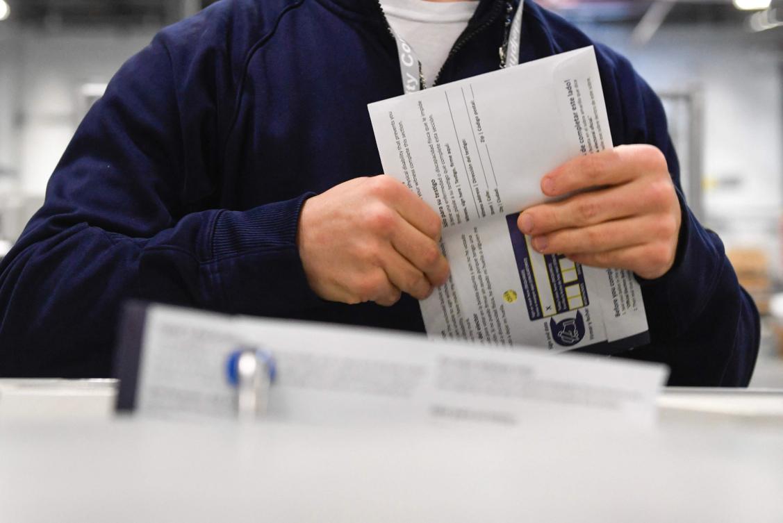 Poll workers demonstrate how ballots are are received, processed, scanned, and securely stored on Election Day at the Philadelphia Election Warehouse on Oct. 25, 2024 in Philadelphia, Pennsylvania. (Getty Images/AFP)