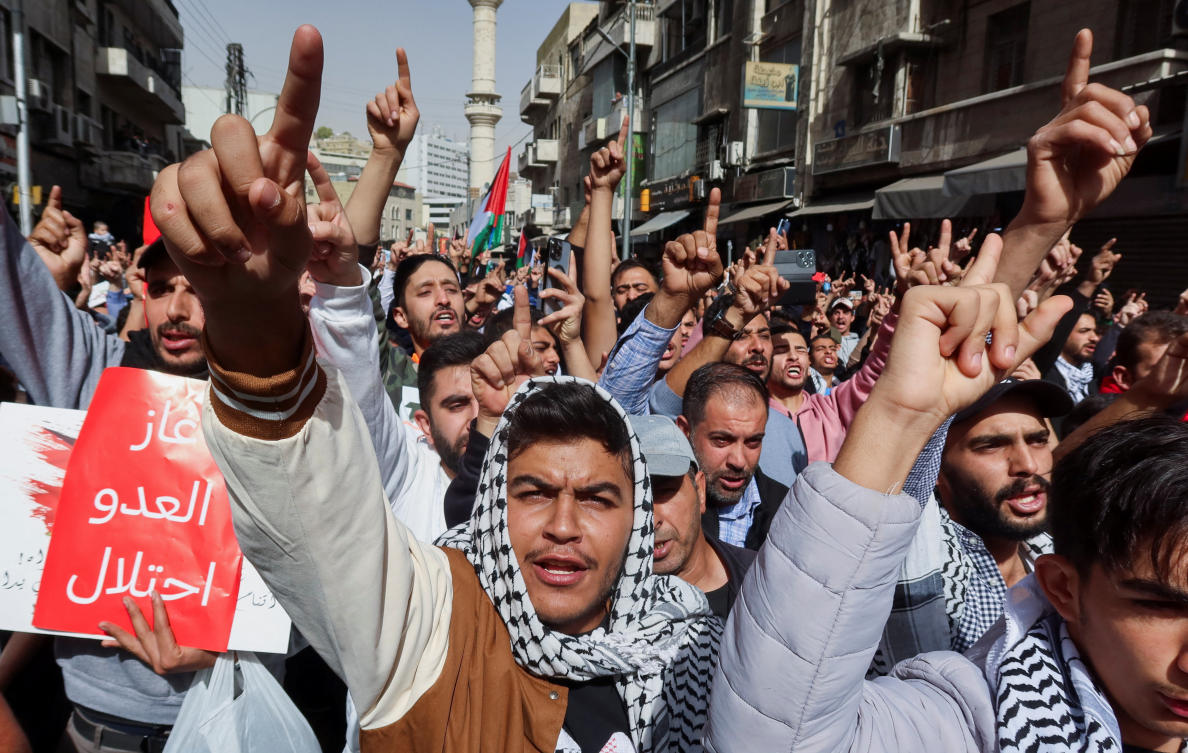 Demonstrators gesture during a protest in support of Lebanon and Gaza in Amman, Jordan on Oct. 25, 2024. (Reuters)