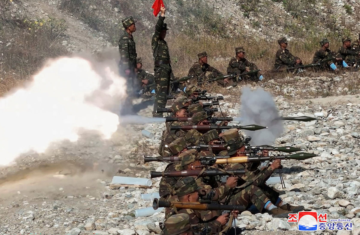This picture taken on October 2, 2024 and released from North Korea's official Korean Central News Agency shows troops taking part in training at an undisclosed location in North Korea. (KCNA via KNS / AFP)