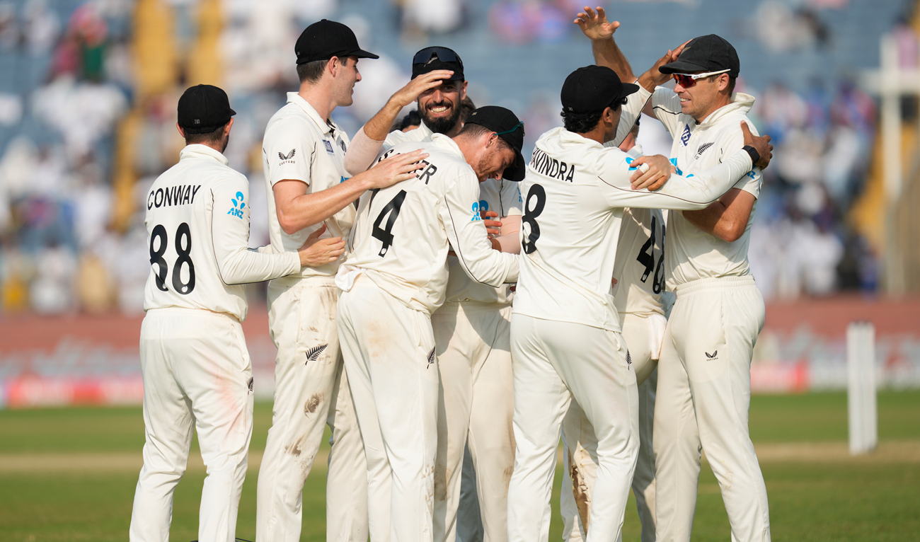 New Zealand’ players celebrate after their win against India on the day three of the second cricket test match at the Maharashtra Cricket Association Stadium in Pune, India on October 26, 2024. (AP)