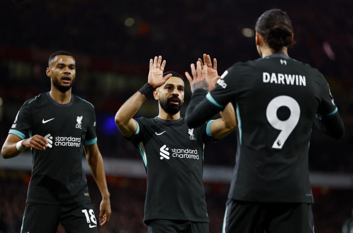 Liverpool’s Mohamed Salah celebrates scoring their second goal against Arsenal with Darwin Nunez. (Action Images via Reuters)