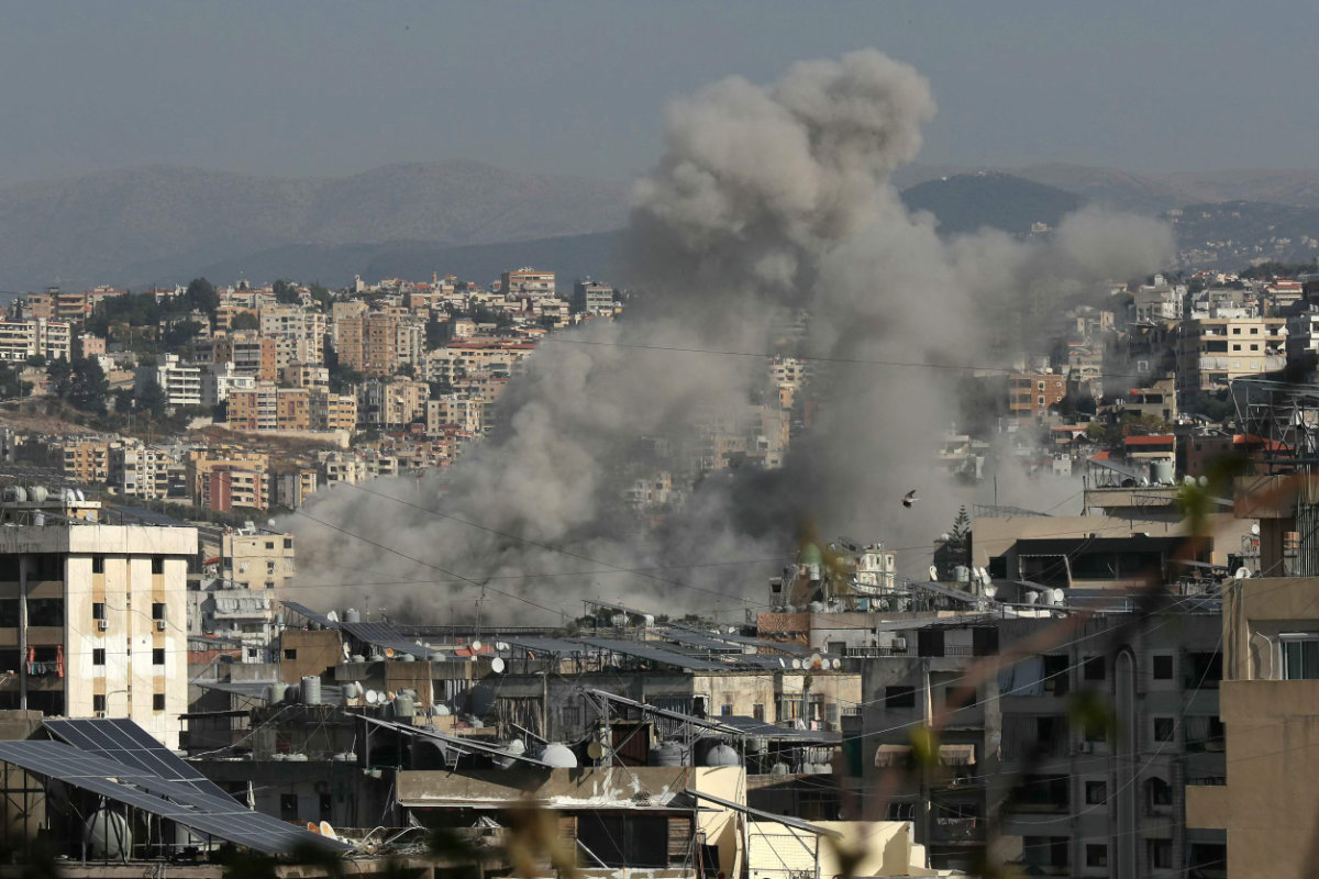 Smoke rises from the site of an Israeli airstrike that targeted the Haret Saida area, next to southern Lebanese city of Sidon on Oct. 27, 2024. (AFP)