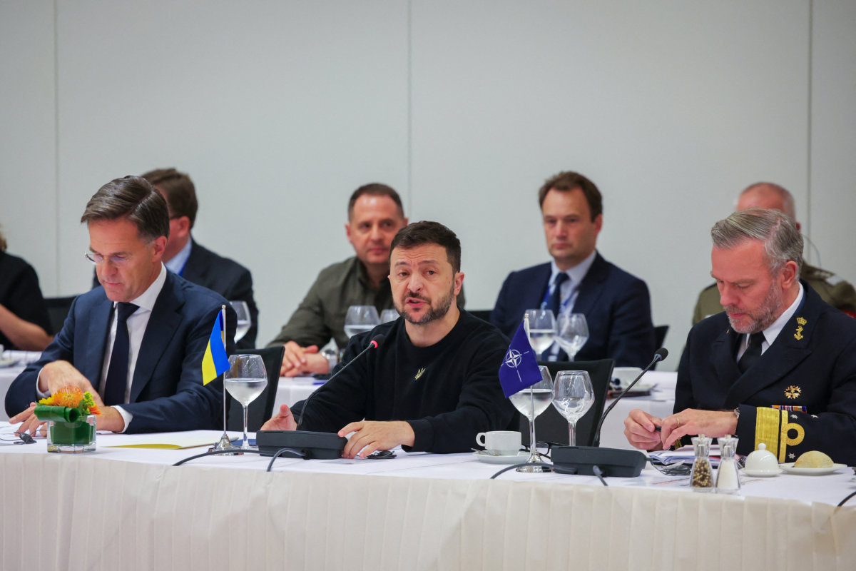Ukraine's President Volodymyr Zelensky (C) speaks during a NATO-Ukraine Council Working Dinner in Brussels, Belgium, on Oct. 17, 2024. (Pool/AFP)