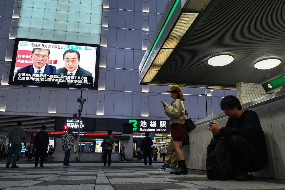 Japan’s Prime Minister Shigeru Ishiba, left, and head of the opposition Constitutional Democratic Party Yoshihiko Noda are expected to likely bid for the premiership. (AFP)