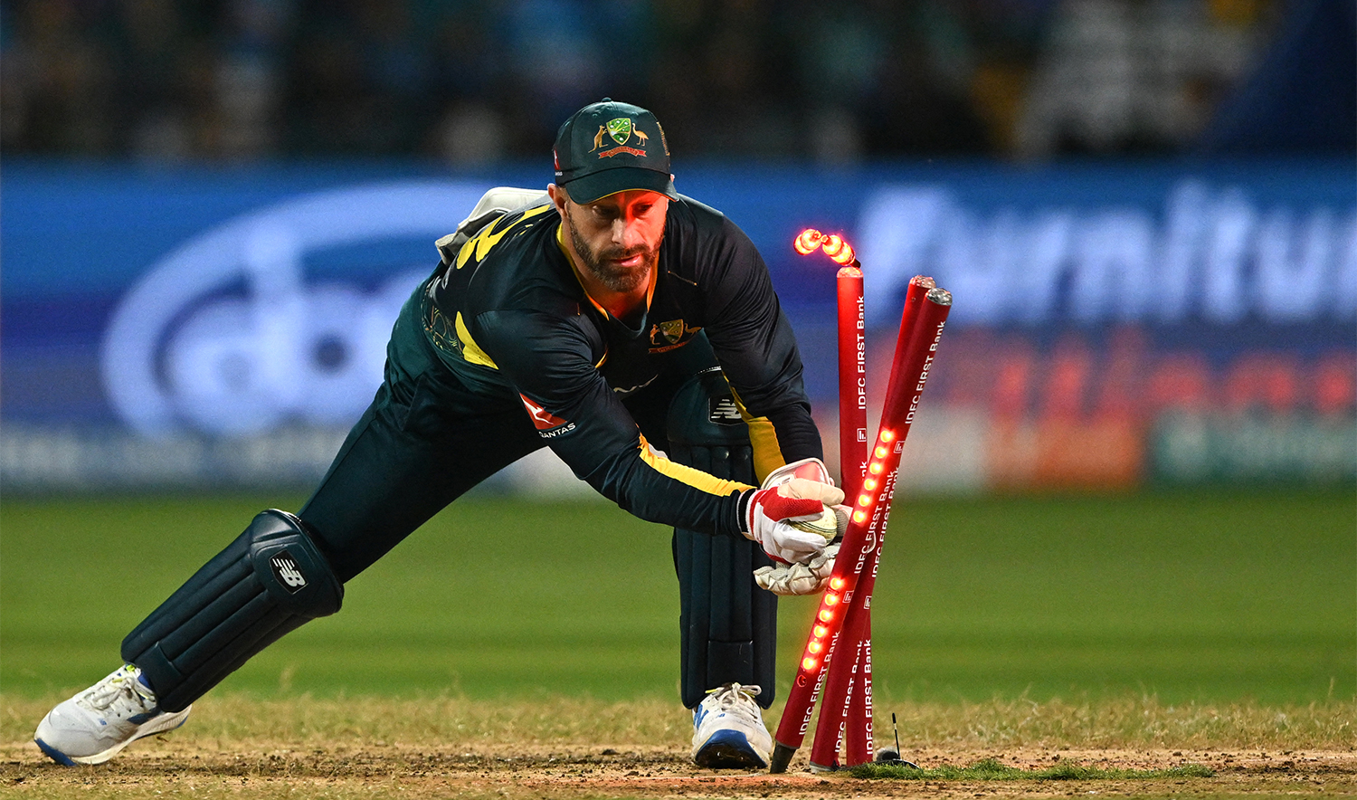 Australia's wicketkeeper captain Matthew Wade runs out India's Ravi Bishnoi during the fifth and final Twenty20 international cricket match between India and Australia at the M. Chinnaswamy Stadium in Bengaluru on December 3, 2023. (AFP/File)