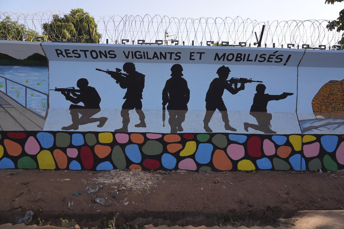 About half of Burkina Faso is outside of government control as the country has been ravaged by increasing militant attacks encircling the capital Ouagadougou. Above, a mural reading ‘Stay vigilant and mobilized’ in Ouagadougou on March 1, 2023. (AP)