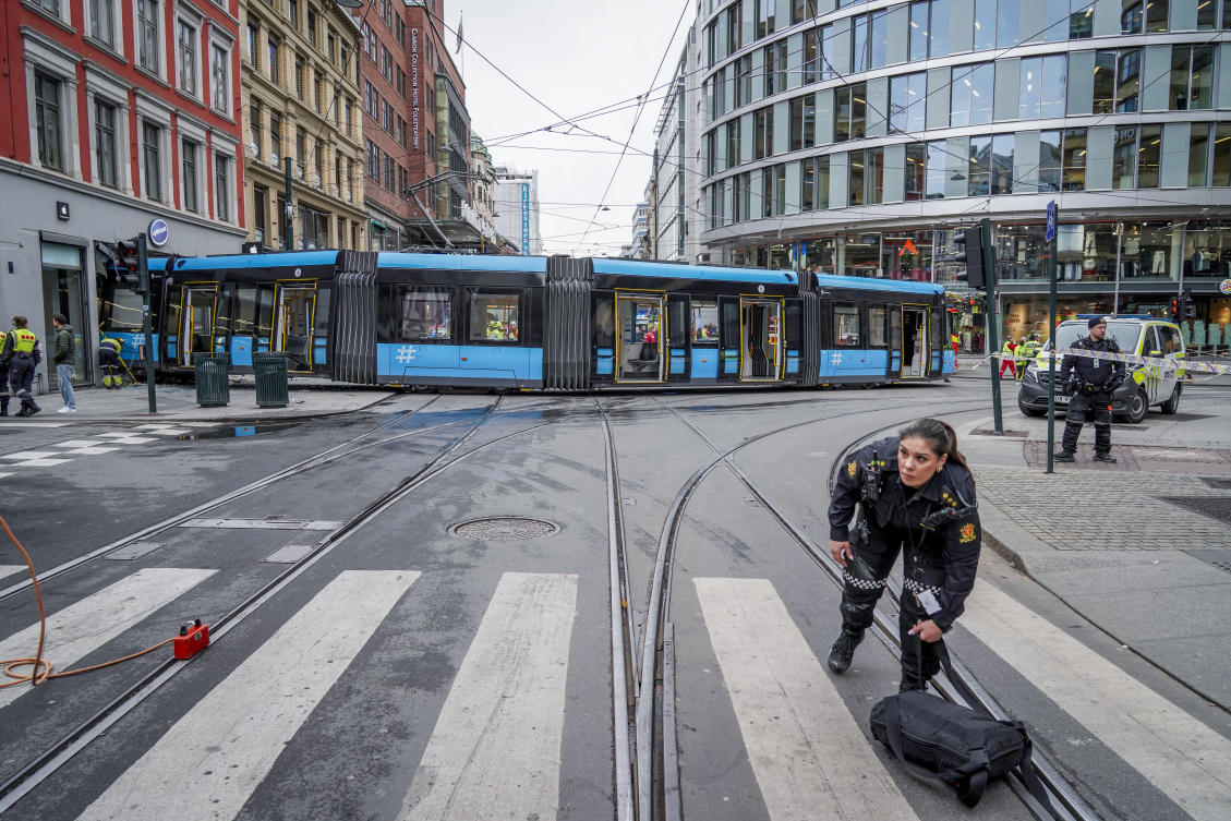 A derailed tram that crashed into a store in central Oslo on Tuesday had around 20 passengers onboard when the incident happened. (NTB Scanpix via AP)