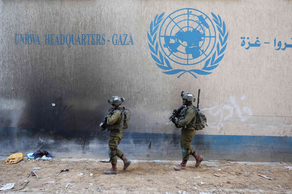 This picture taken during a media tour organized by the Israeli army on Feb. 8, 2024 shows Israeli soldiers inside an evacuated UNRWA compound in Gaza City. (AFP)