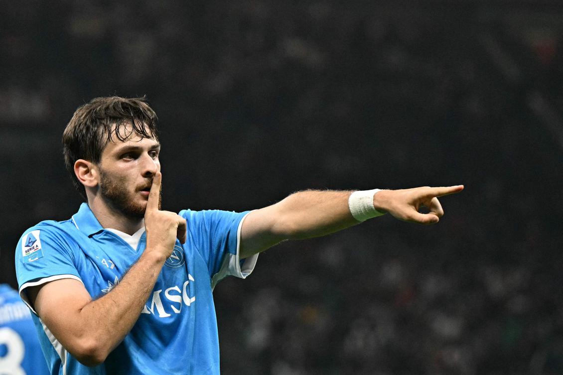 Khvicha Kvaratskhelia celebrates scoring. (AFP)