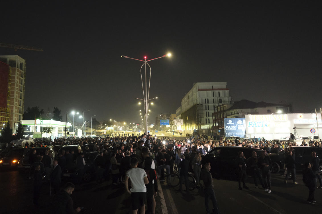 Albanian opposition protesters block a main avenue demanding that the government be replaced by a technocratic caretaker Cabinet, in Tirana, Albania. (AP)