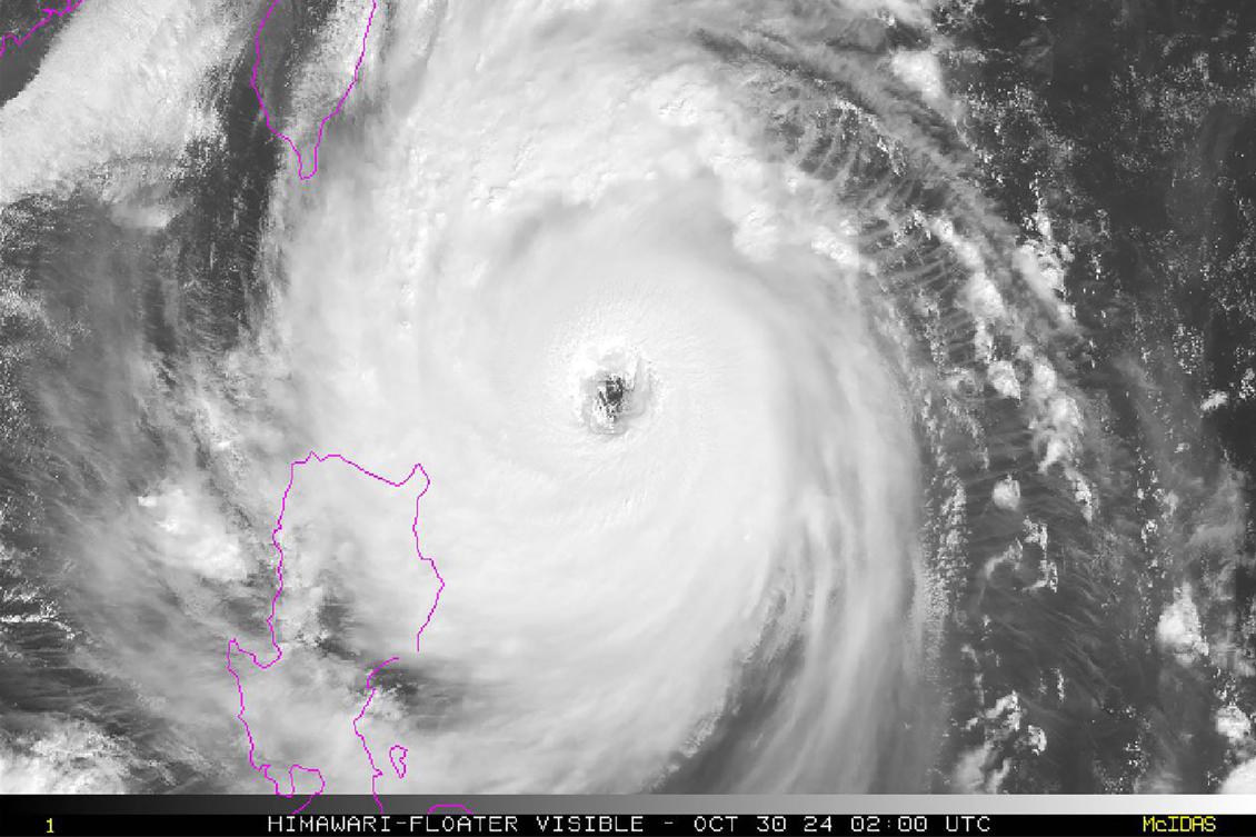 Above, a satellite image taken and released on Oct. 30, 2024 shows super typhoon Kong-rey as it develops over the West Pacific. Taiwan expects the super typhoon to make landfall on Thursday along its sparsely populated east coast. (NOAA/AFP)