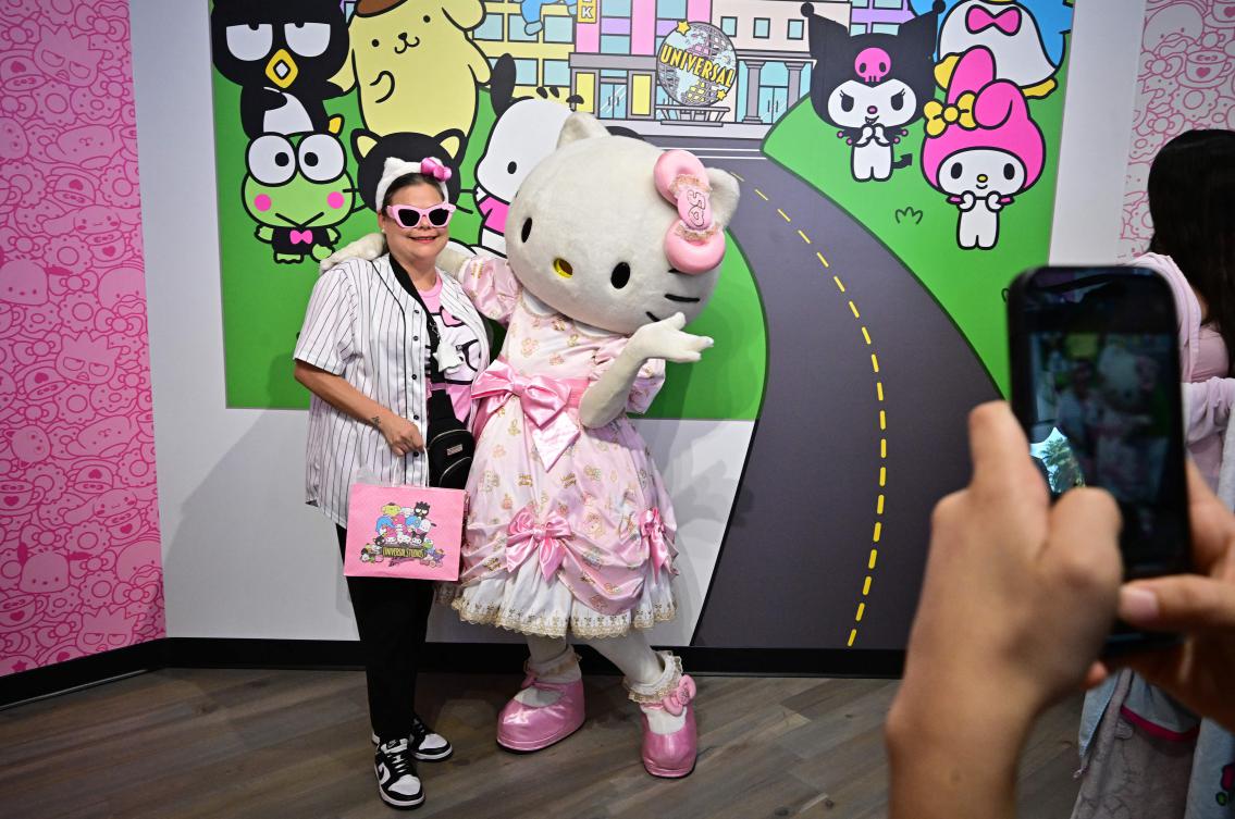 Hello Kitty started life as an illustration on a vinyl coin purse, and has since appeared on tens of thousands of products including tie-ups with Adidas, Balenciaga and other top brands. (AFP)