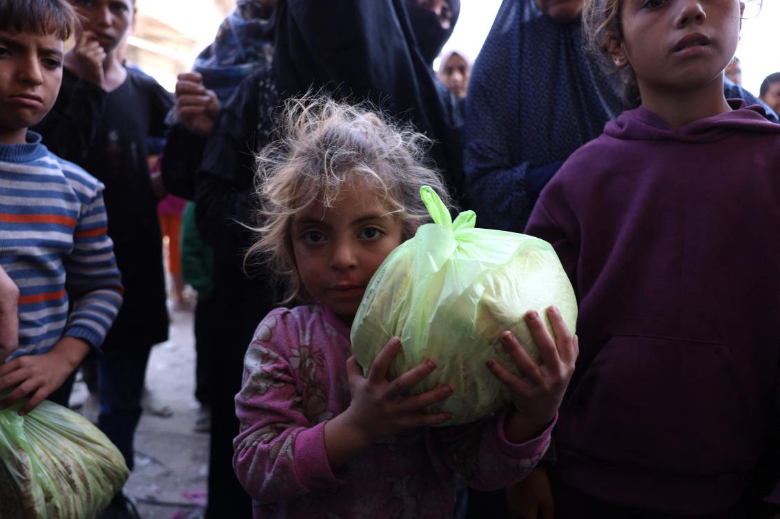 Israeli legislation cutting ties with the UN agency for Palestinian refugees has raised fears that the largest provider of aid to Gaza could be shut out of the war-ravaged territory. (AFP)