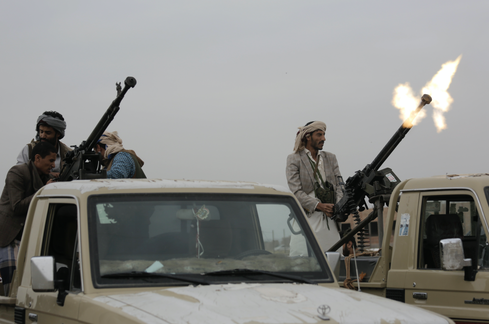 A Houthi fighter fires in the air during a mobilization in Sanaa, Yemen, Thursday, Aug. 1, 2019. (AP Photo)