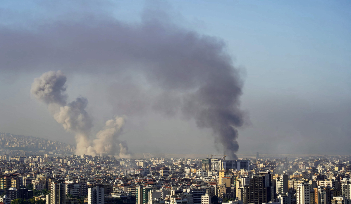 Smoke rises from the site of an Israeli airstrike that targeted Beirutís southern suburbs on October 5, 2024. (AFP)