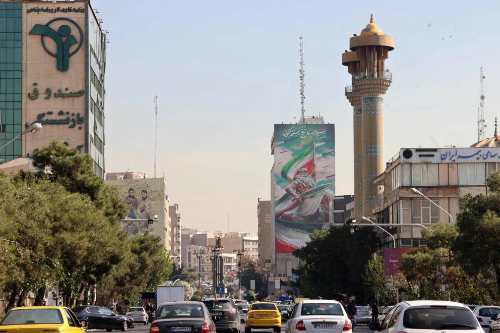 Commuters drive along a street in Tehran on October 26, 2024. (AFP)