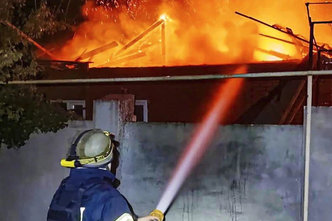 ‘Everything black’: Russian strike kills six at Kherson market