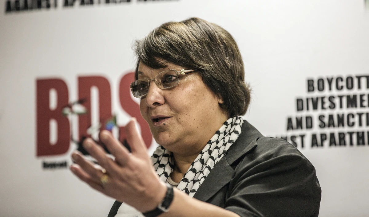 Palestinian Liberation Front veteran Leila Khaled attends a press conference upon her arrival at the O.R. Tambo international Airport, on February 6, 2015, in Johannesburg. (AFP/File)