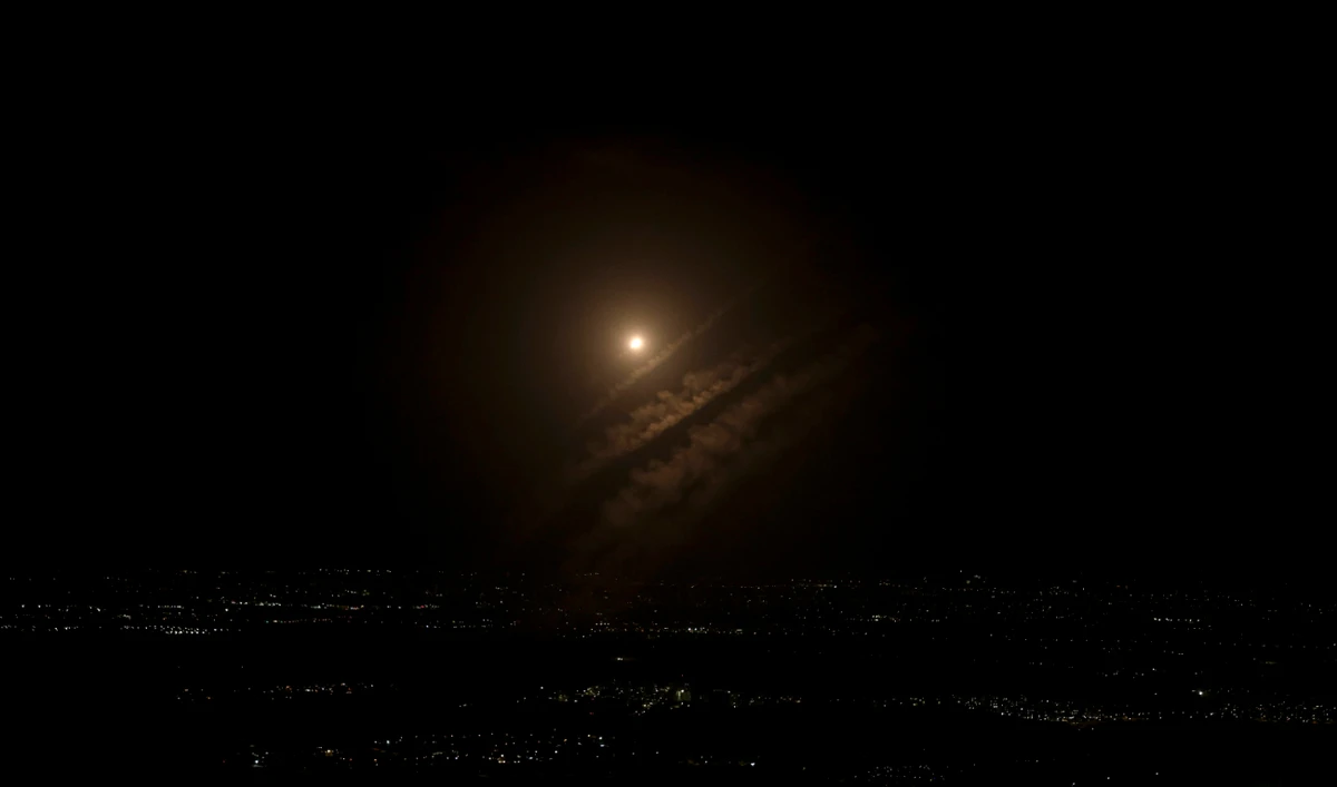 This picture taken from the West Bank city of Hebron shows a projectile above the Israeli city of Ashdod, on October 1, 2024. (AFP)